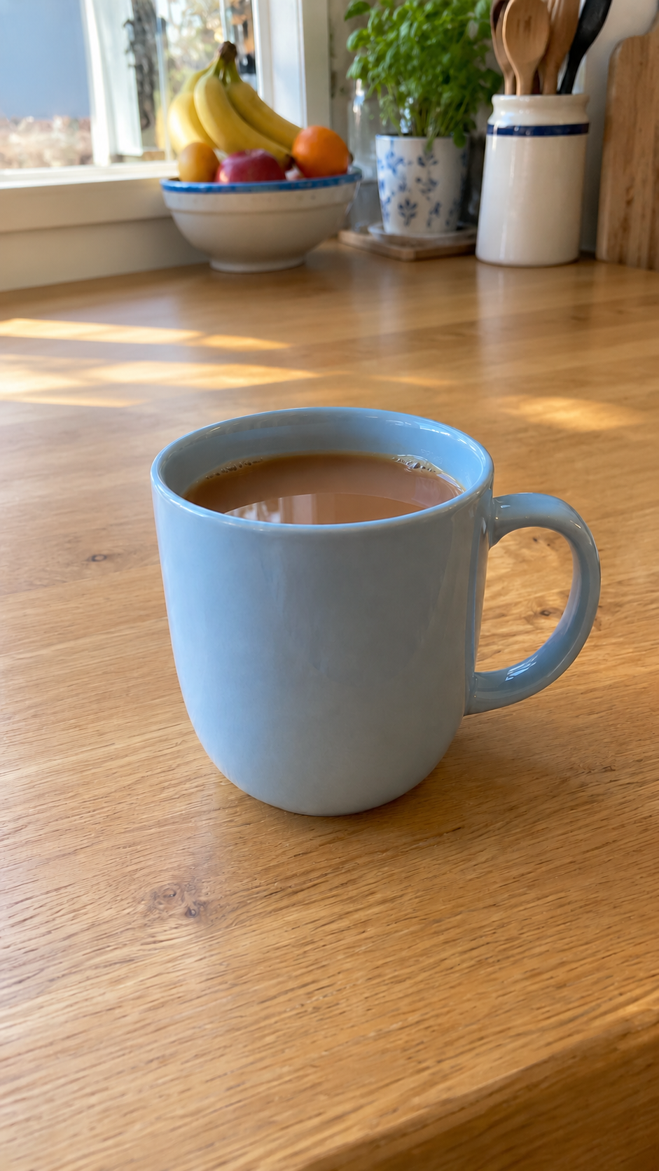 Illustrative alternative: the same mug with the packet, books and cloth removed